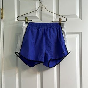 Purple Nike DriFit shorts